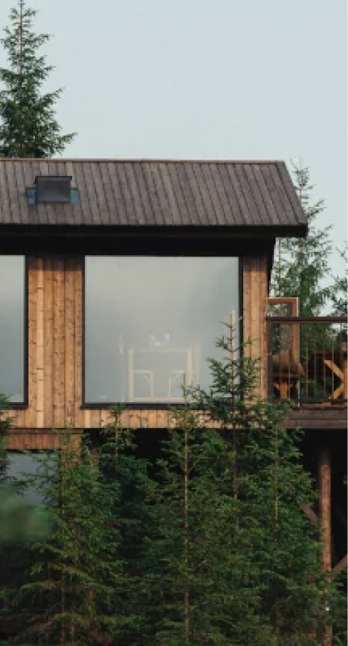 A cabin high above from the ground among the trees