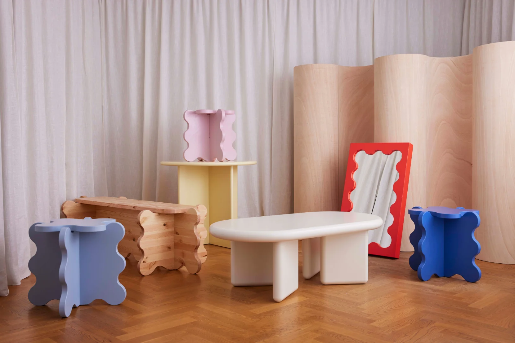 A blue room containing several of Gustav Westmans various furniture designs.